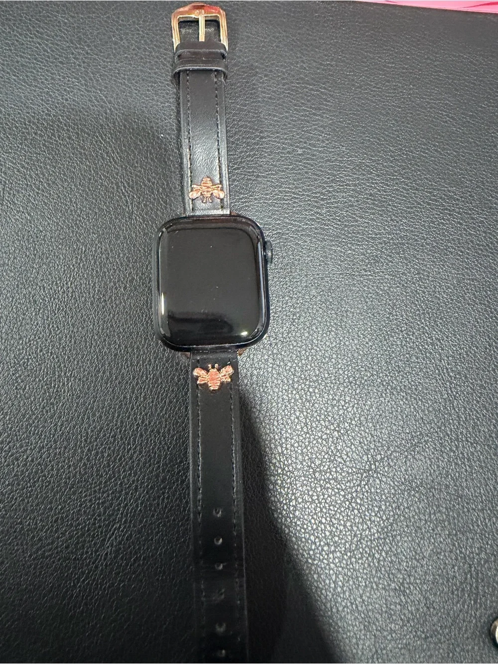 Apple Smartwatch with Black Case and Rose Gold Accents
